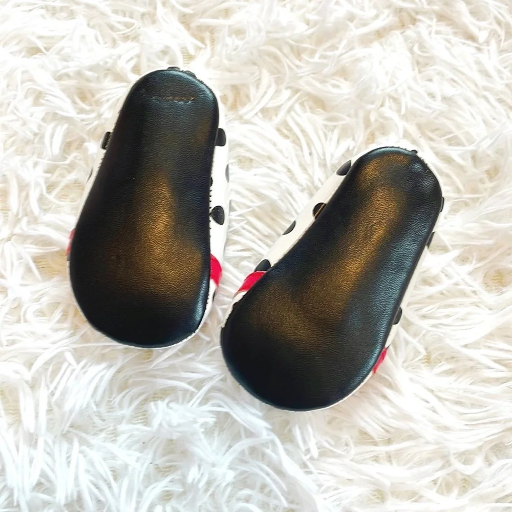 Place • Black and White Baby Polka Dot Mary Janes with Red Bow Accent Detailing